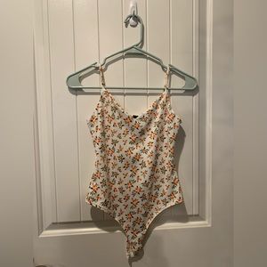 Bodysuit white with orange flowers